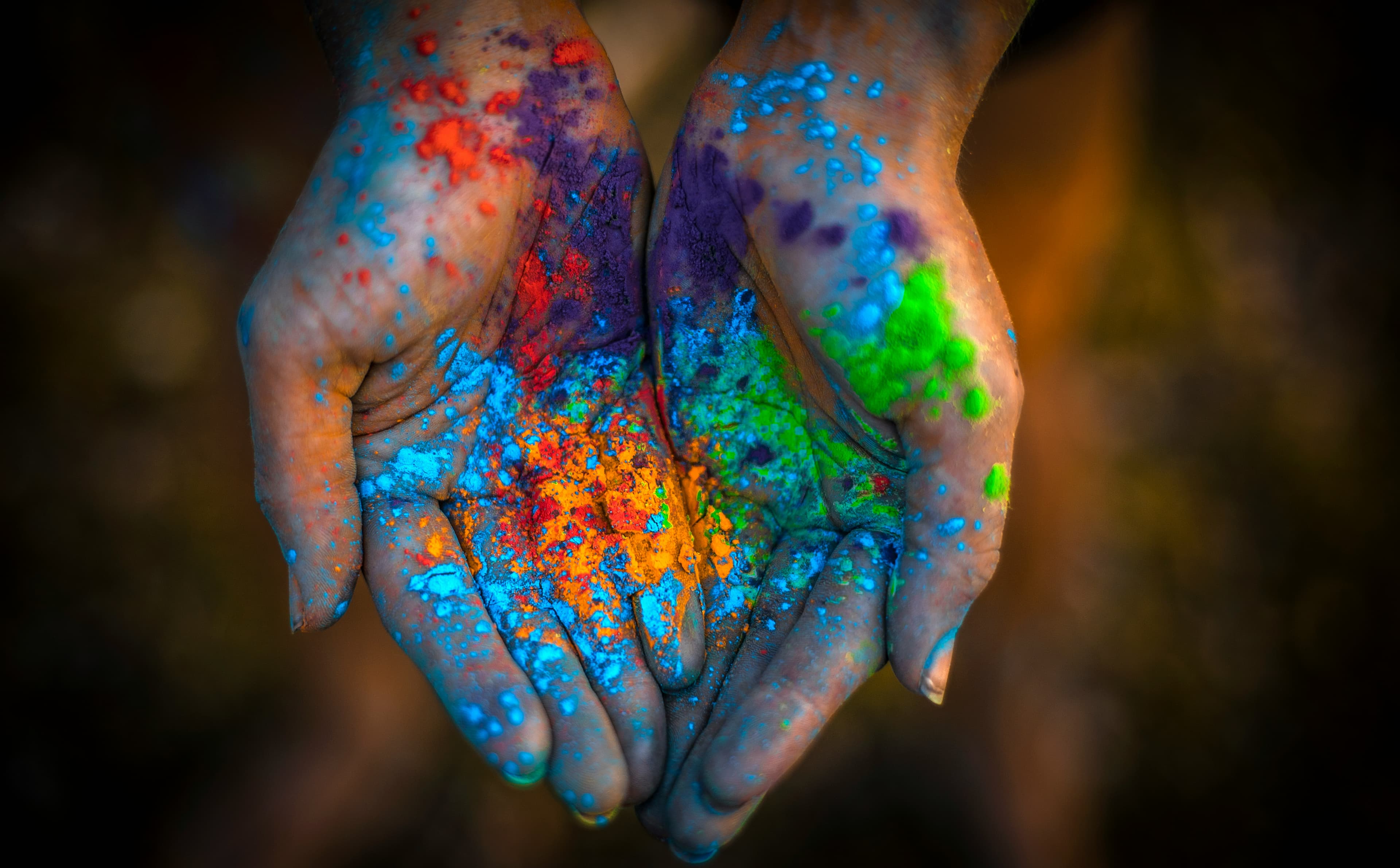 Colourful hands with paint